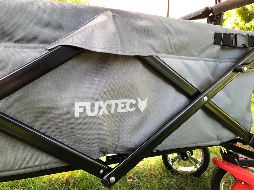 Seitenwand mit Fuxtec-Logo und Scherengestänge